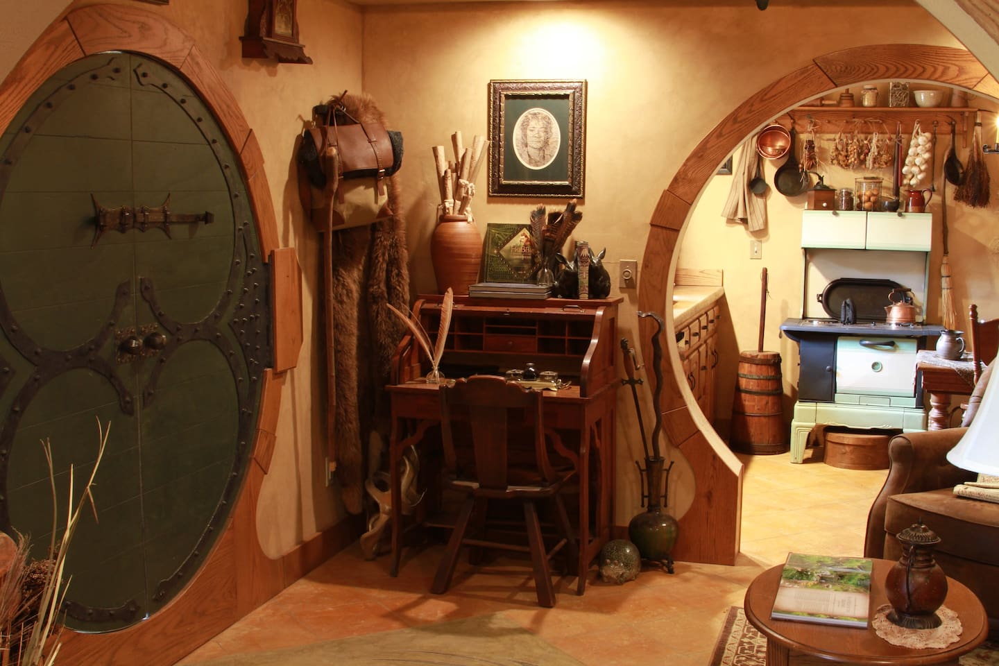 Writing desk, scrolls,  backpack, walking stick, Warg hide and Adventure treasures.