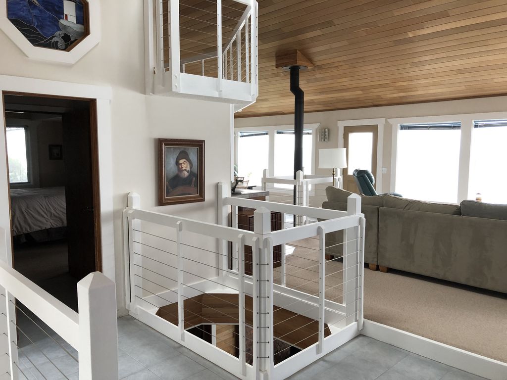 3rd Floor with view to the ocean. Loft area and opening to kitchen on 2nd floor.