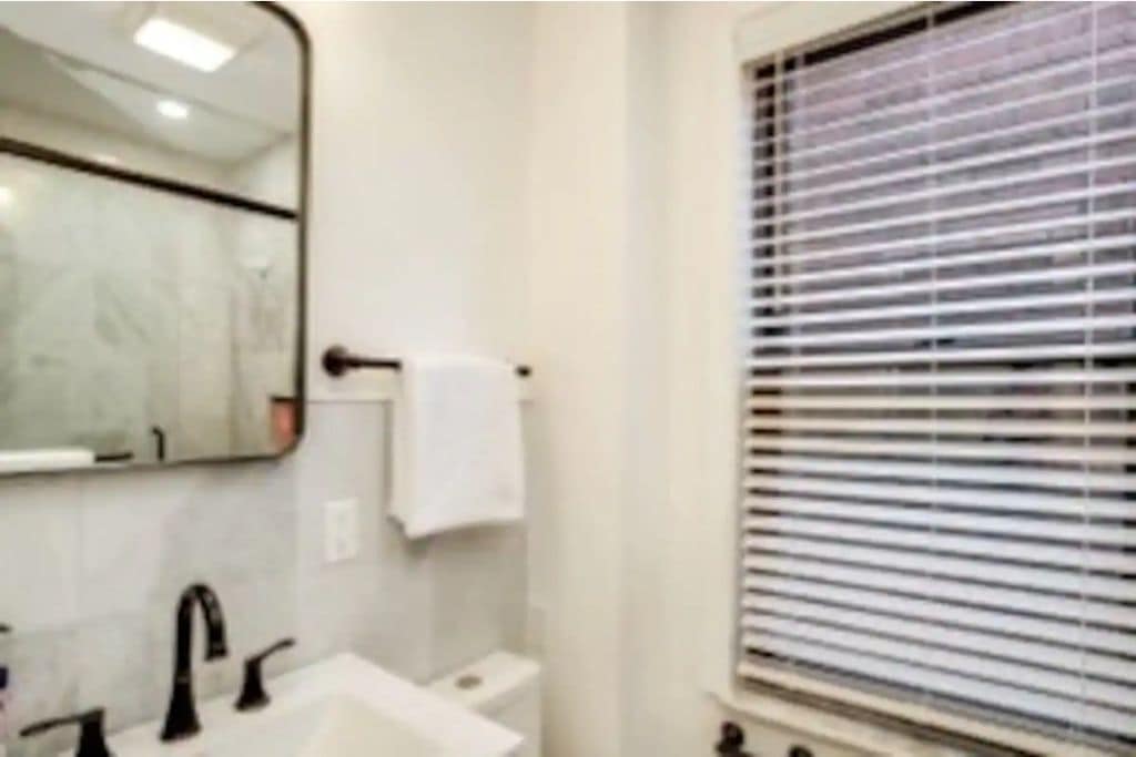 There is a guest bathroom for the green and red rooms.