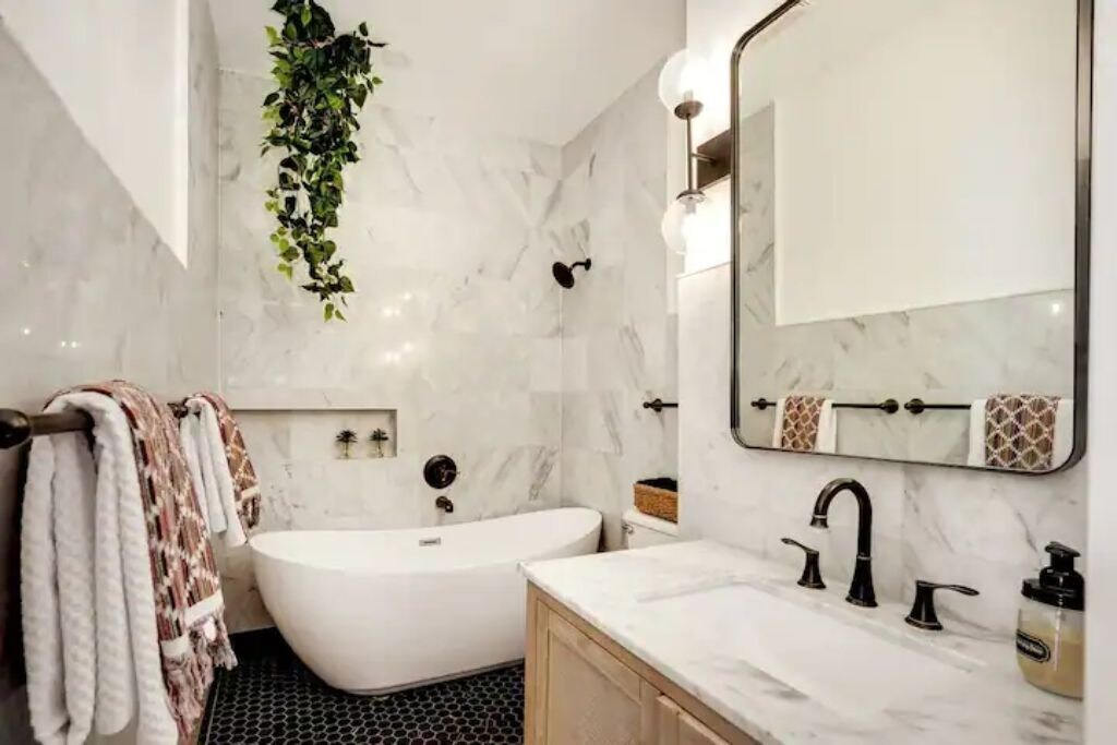 The primary bathroom has a wonderful bathtub and shower