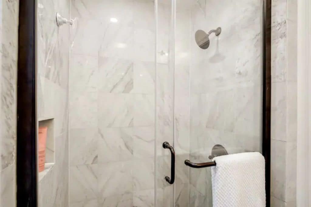 The guest bathroom has a shower.