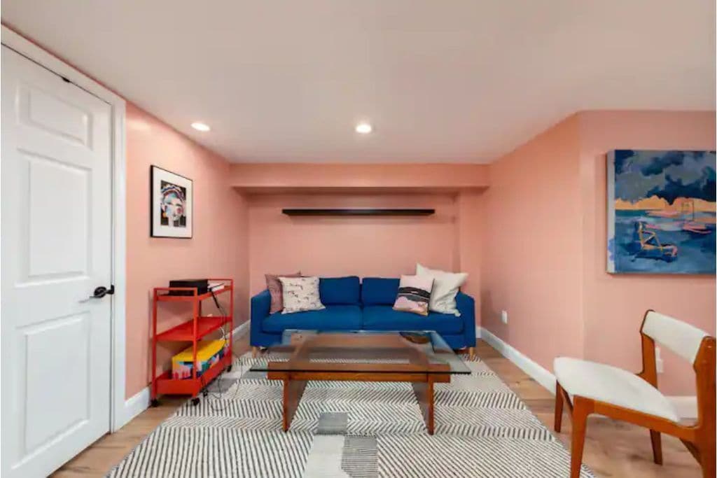 The basement has a movie room with a sofa bed. There is a projector for use.